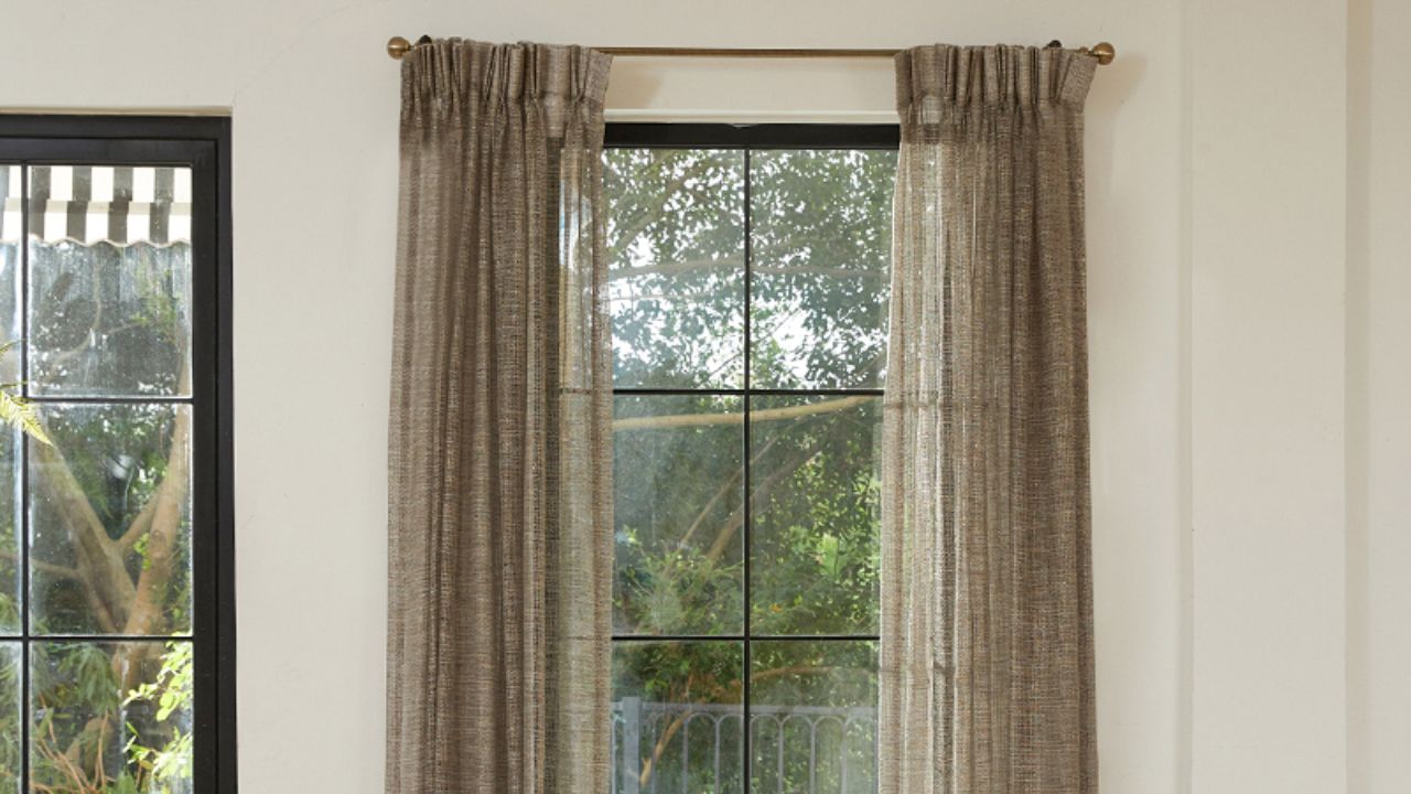 Use Curtains to Make Small Rooms Larger
